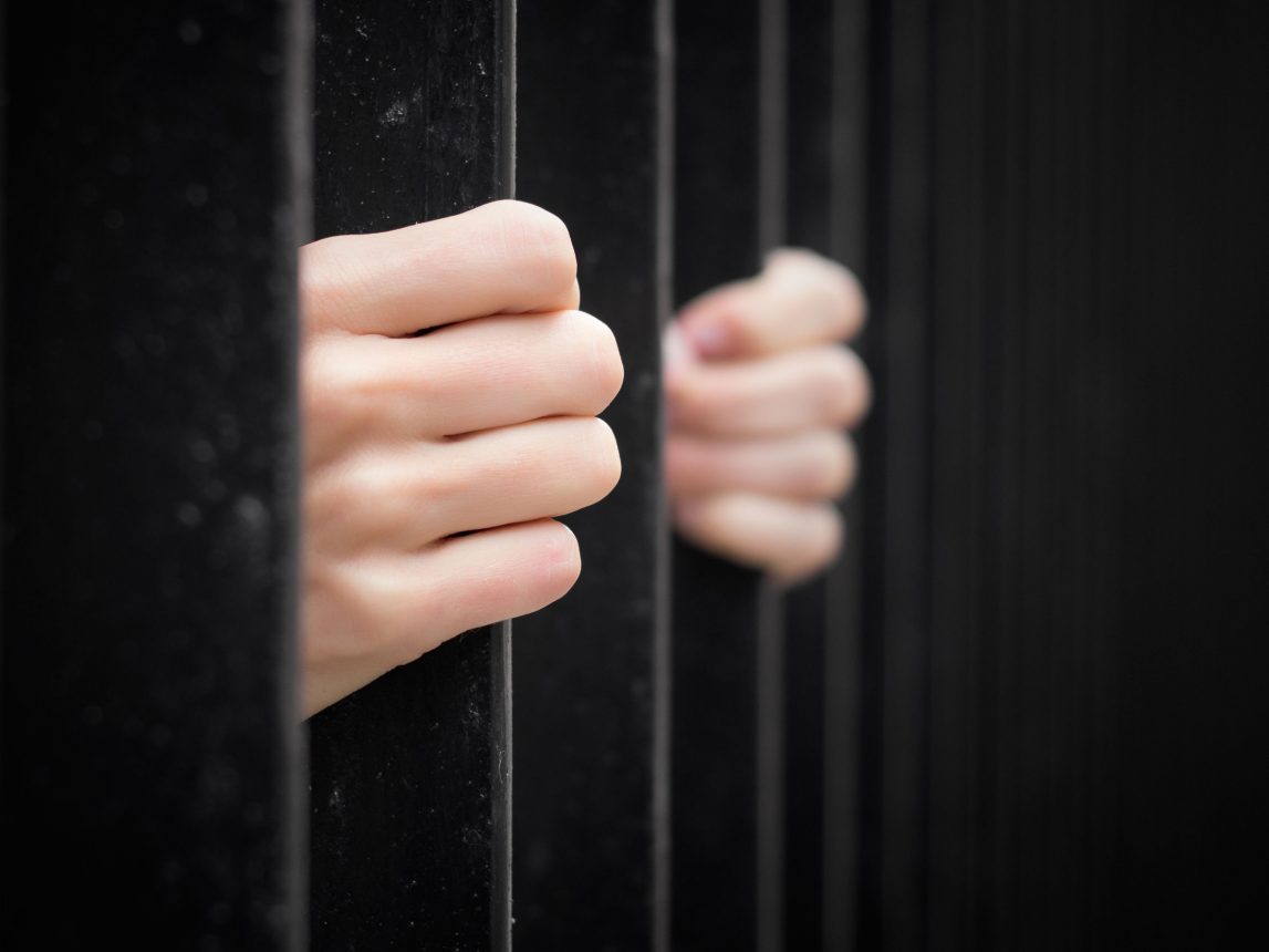 man behind bars